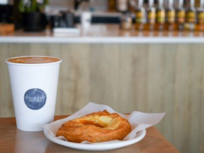 A golden latte and pumpkin danish Gold Cup Coffee House.